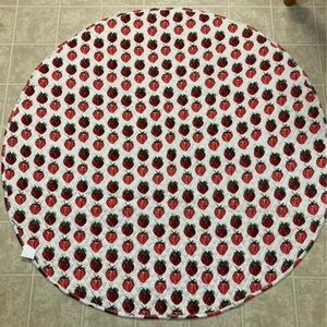 Kate Quinn strawberry circle play mat modal